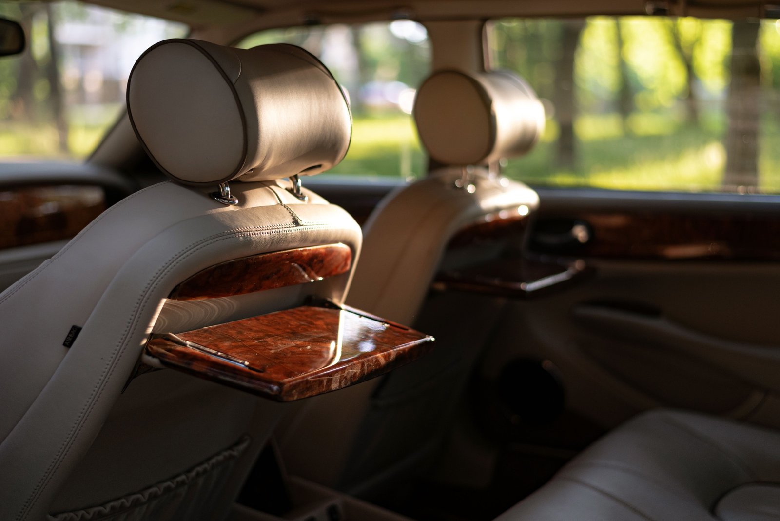 Hand-finished leather and wood inside a luxury vehicle